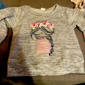 Gray crew neck sweatshirt with little girl on it